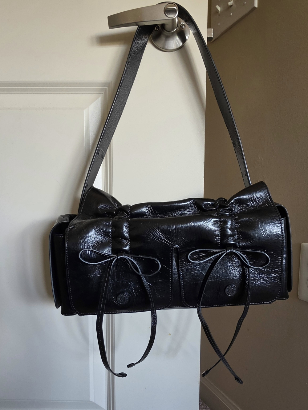Acne Studios Multipocket bag in black patent